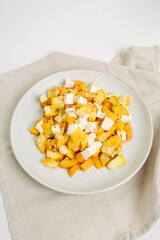 A dietary dish made from zucchini and feta cheese.