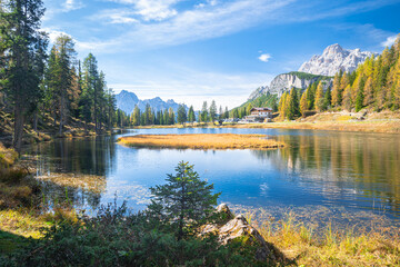 Idyllic view of the calm waters of Lake Antorno in the Dolomite Mountains of Italy on a sunny day...