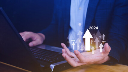 Interest rate and dividend concept, Businessman with percentage symbol and up arrow, 2024, Interest rates continue to increase, return on stocks and mutual funds, long term investment for retirement.