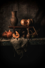 Still life pumpkin and vintage jugs