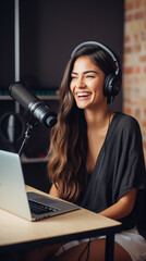 The cheerful girl host records a podcast using a microphone, wearing headphones, conducting interviews with guests for content in her home studio