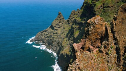 Epic green mountain landscape on ocean coastline, hiking trail in Anaga rural park. Chinamada Tenerife Canary Islands Spain.