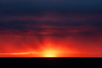 Dramatic sunset over polar tundra