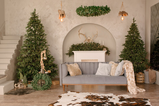 new year cozy home interior with Christmas tree and garlands 