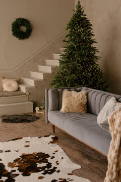 new year cozy home interior with Christmas tree and garlands 