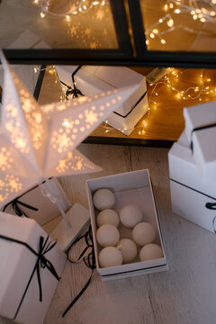 new year cozy home interior with Christmas tree and garlands 