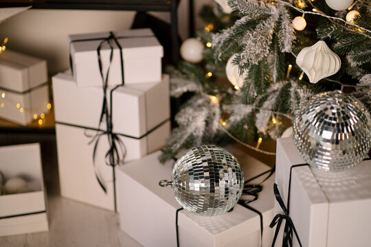 new year cozy home interior with Christmas tree and garlands 