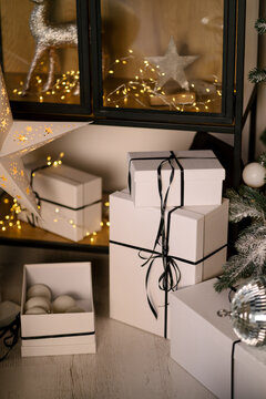 new year cozy home interior with Christmas tree and garlands 