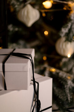 new year cozy home interior with Christmas tree and garlands 