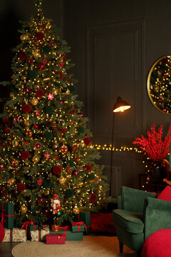 new year cozy home interior with Christmas tree and garlands 