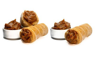 Argentinian sweet, dulce de leche cannon on isolated white background.