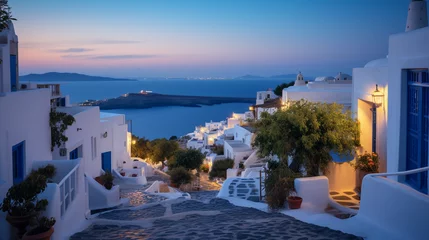  Greek island village, white and blue architecture, winding narrow lanes, sunset over the ocean © Marco Attano