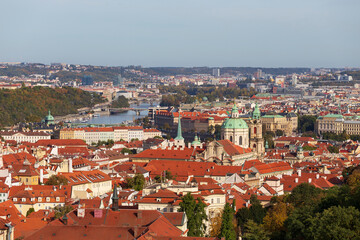 Naklejka na ściany i meble Autumn Prague City with colorful Trees from the Hill Petrin, Czech Republic