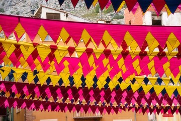 Colorful ribbons, garlands, or flags to decorate a party or event