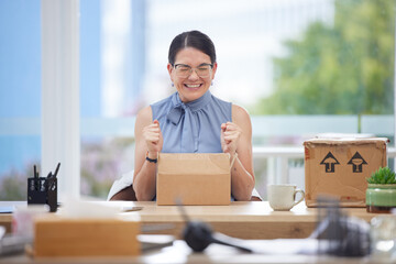 Excited, delivery and box of business woman in office happy with product from courier service,...