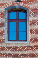 Fototapeta na wymiar window on the brick wall,A window against a brick wall