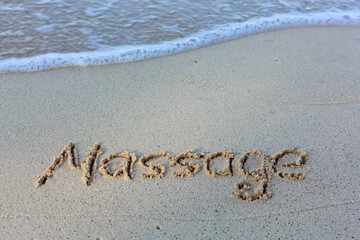 Fototapeta premium Word massage handwritten on the caribbean sand.