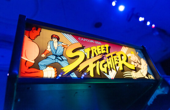 Blackpool, uk, 01.01.2023 A vintage retro street fighter 2 arcade game signage on an old arcade game cabinet at a retro vintage arcade computer fair. Norbreck hotel conference room.