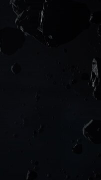 Asteroid belt field in dark outer space. 3D animation wide pan shot. Rock formations of cosmic debris and giant Meteorites. Celestial objects on starry stars background with dust nebula haze low light