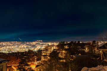 Weak aurora borealis over Oslo