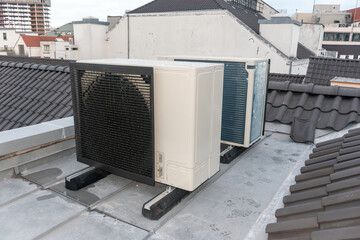 air conditioning unit,Air conditioning installed on the roof of a tall building,Air conditioning, heat pump, - obrazy, fototapety, plakaty