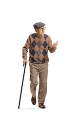 Elderly man with a cane walking and explaining with hand