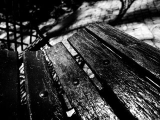 wooden bench in black and white 