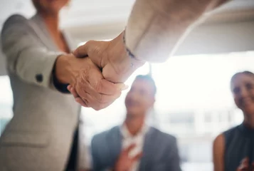 Poster Handshake, hiring and contract with people in office for collaboration, teamwork and thank you. Meeting, B2B and welcome with employee shaking hands for partnership, networking and job promotion © Allistair/peopleimages.com