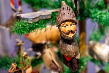 A christmas ball in the shape of a knight in a christmas tree