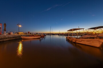 Picture over the harbor of Fazana in Istria in the evening during sunset