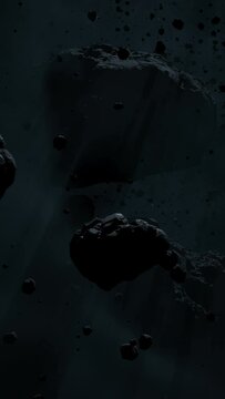 Asteroid belt field in dark outer space. 3D animation wide pan shot. Rock formations of cosmic debris and giant Meteorites. Celestial objects on starry stars background with dust nebula haze low light