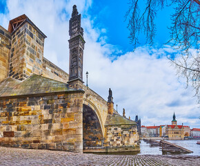 The stone embankment and Charles Bridge, Mala Strana, Prague, Czechia