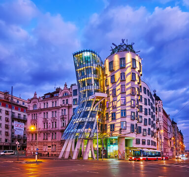 Dancing House in evening lights, on March 7 in Prague, Czechia