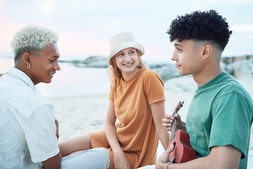 Guitar, relax and friends on holiday at the beach with music from a musician in Spain during summer. Happy, young and travel people playing ukulele instrument on vacation by sea for peace and calm