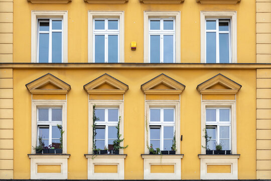 Windows of an old building in Paris, France. Architectural background