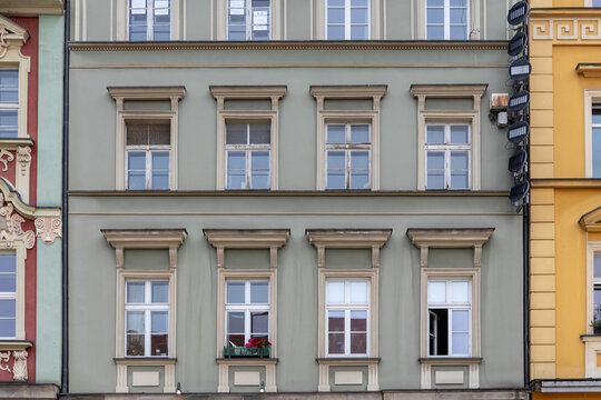Windows of an old building in Paris, France. Architectural background