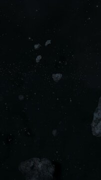 Asteroid belt field in dark outer space. 3D animation wide pan shot. Rock formations of cosmic debris and giant Meteorites. Celestial objects on starry stars background with dust nebula haze low light