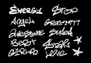 Collection of graffiti street art tags with words and symbols in white color on black background