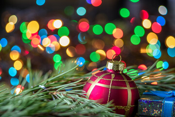 New Year's composition with Christmas tree toys and branch