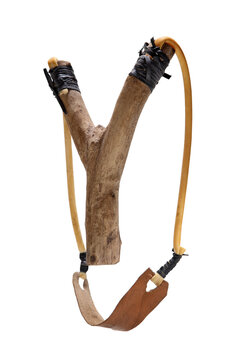 handmade wooden slingshot on cut out background