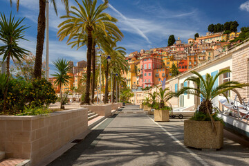 Fototapeta na wymiar Walking alley along the sea in old part of town of Menton, French Riviera, France