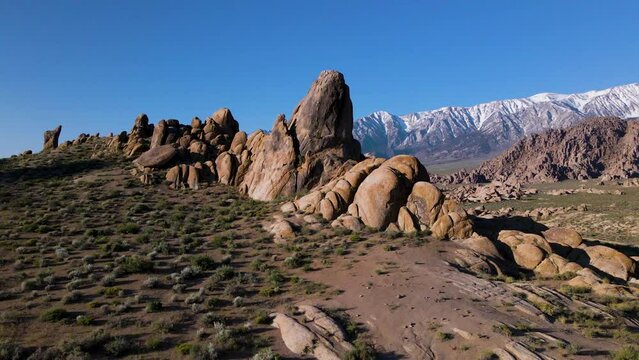 Cinematic aerial shot of rocky landscape in Alabama Hills in California, USA
