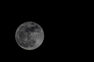 Photo of the full moon with black background. Colombia. 