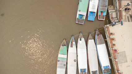 Banjarmasin's Siring river area which is filled with rental engine boats used for Banjarmasin river tourism