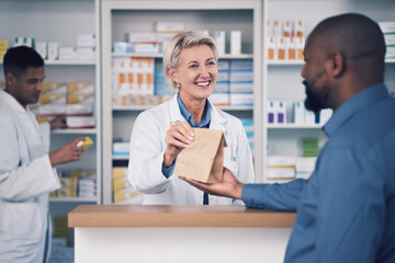 Happy woman, pharmacist and paper bag for patient, healthcare or medication at the pharmacy. Female...