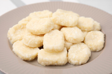 Tasty lazy dumplings on plate, closeup view