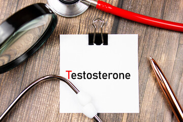 TESTOSTERONE text,acronym on paper with stethoscope. Testosterone, male hormone medical concept.