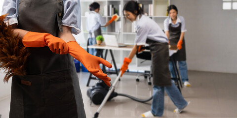 Team of maid housekeeping service cleaning wearing uniform cleaning at office