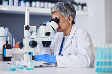 Microscope, science and woman in laboratory to check research, medical analysis and study genes,...