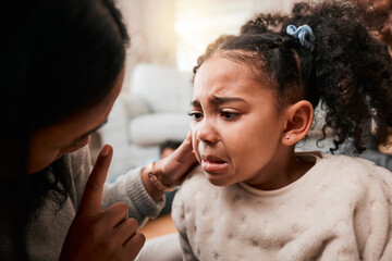 Discipline, angry and mother with girl, home and unhappy with expression, crying and naughty. Serious, female child and mama with conflict, sad and conversation with reprimand, punish kid and advice - obrazy, fototapety, plakaty